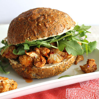 spicy roasted cauliflower, hummus and arugula sandwiches